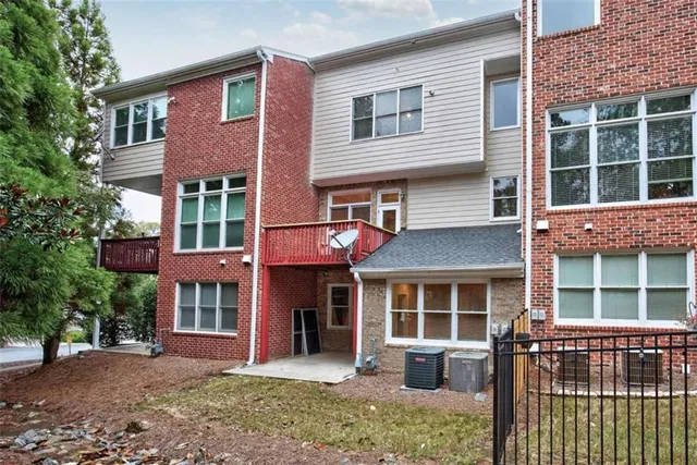 a front view of a house with a yard and porch