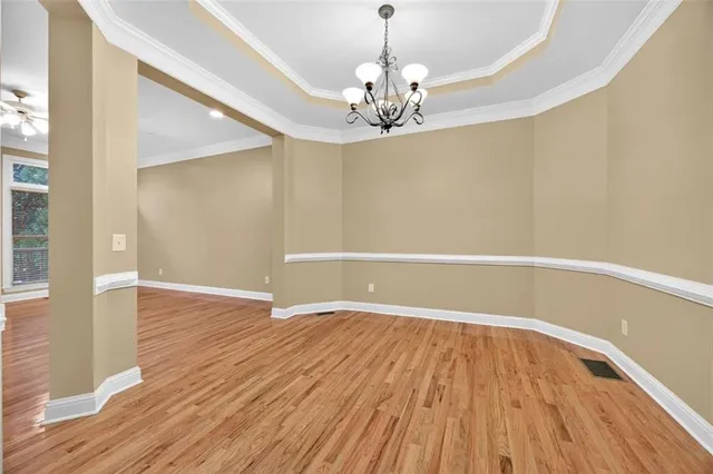 a view of wooden floor in an empty room