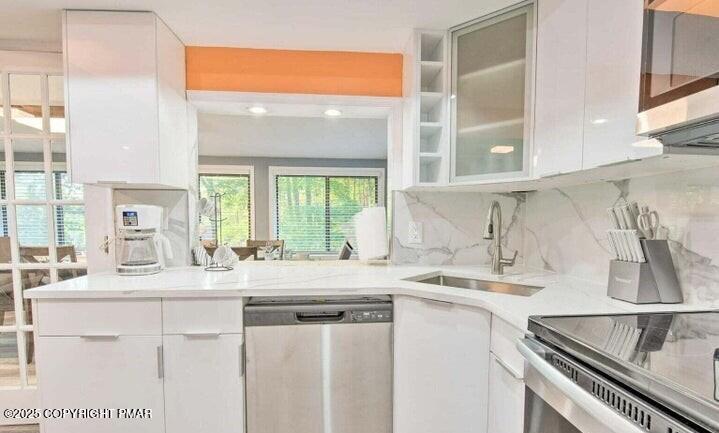 479 Mountain Road Albrightsville, PA 18210 - Photo 11 of 30 a kitchen with kitchen island granite countertop a sink and a stove top oven