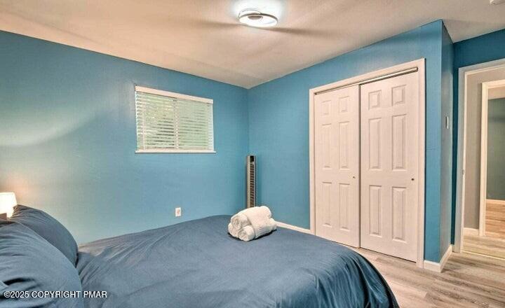 479 Mountain Road Albrightsville, PA 18210 - Photo 28 of 30 a bedroom with a bed and window