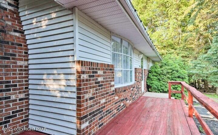 479 Mountain Road Albrightsville, PA 18210 - Photo 3 of 30 a view of deck in the backyard with large windows