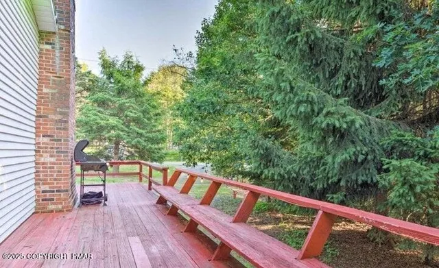 a view of balcony with furniture