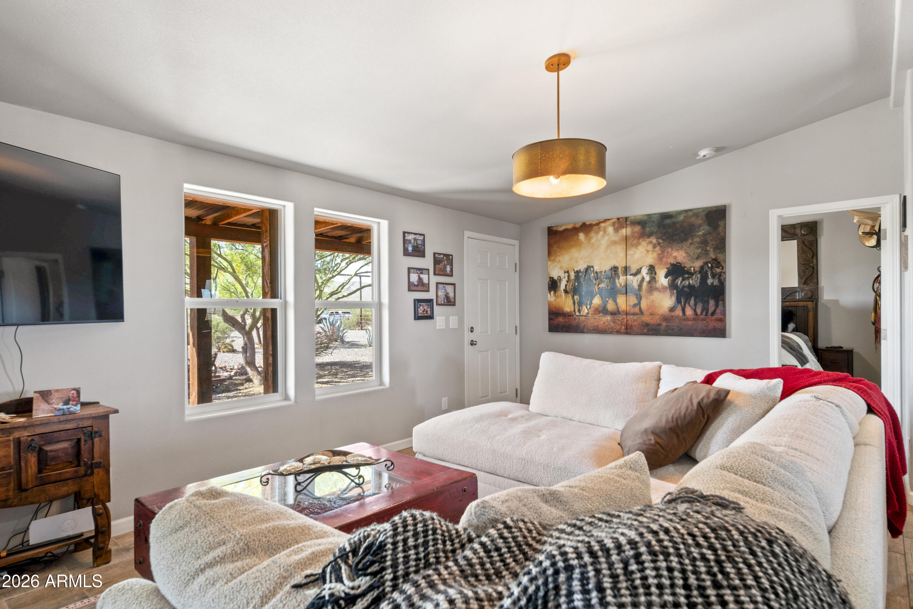 52510 Williams Road Aguila, AZ 85320 - Photo 21 of 62 a bedroom with a bed and a window