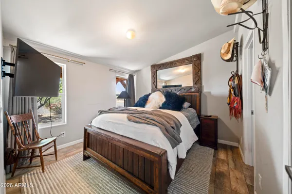 a view of a house with sitting area and garden