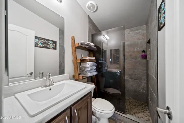 a view of a chairs and tables in patio