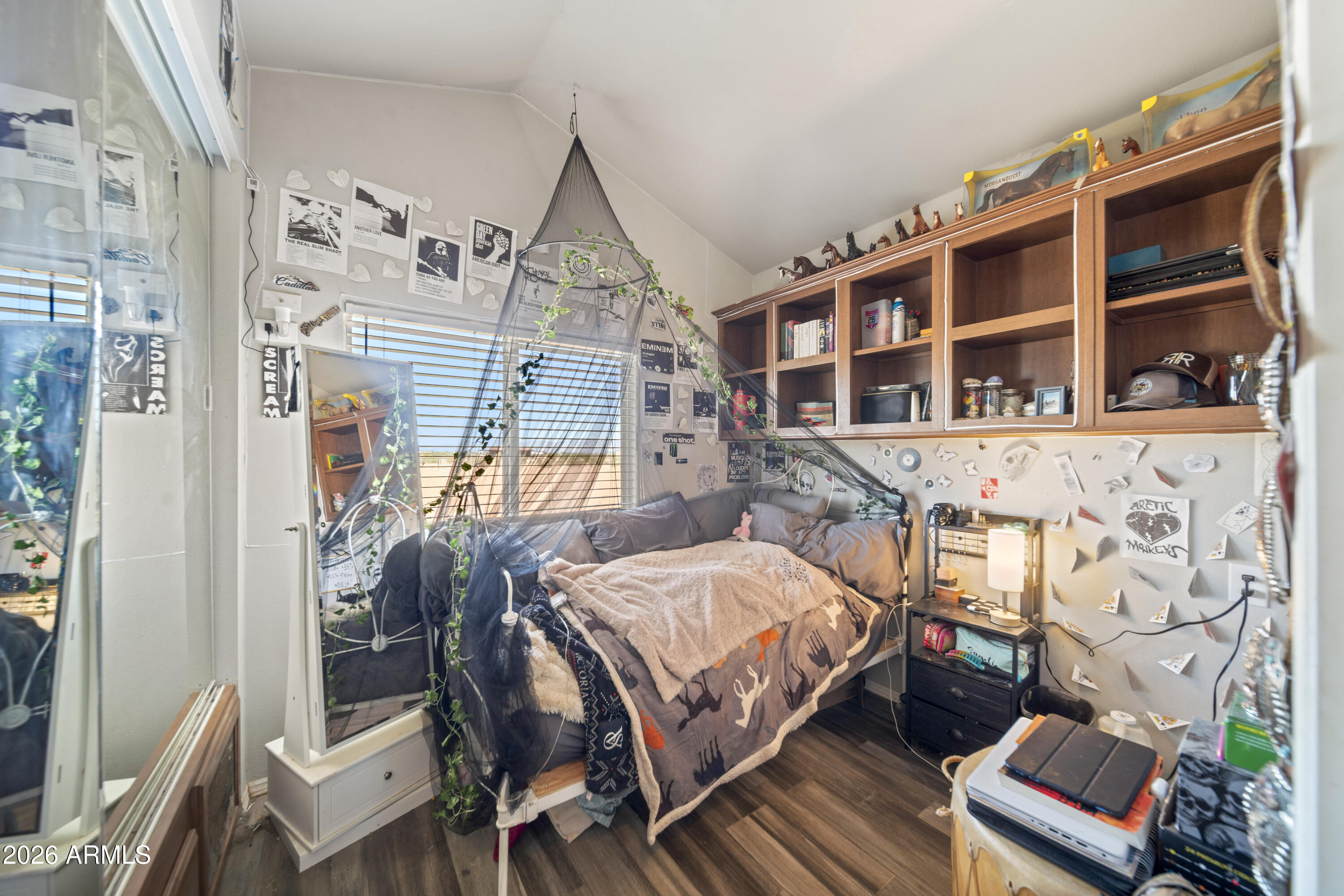 52510 Williams Road Aguila, AZ 85320 - Photo 36 of 62 a bedroom with a bed and a window