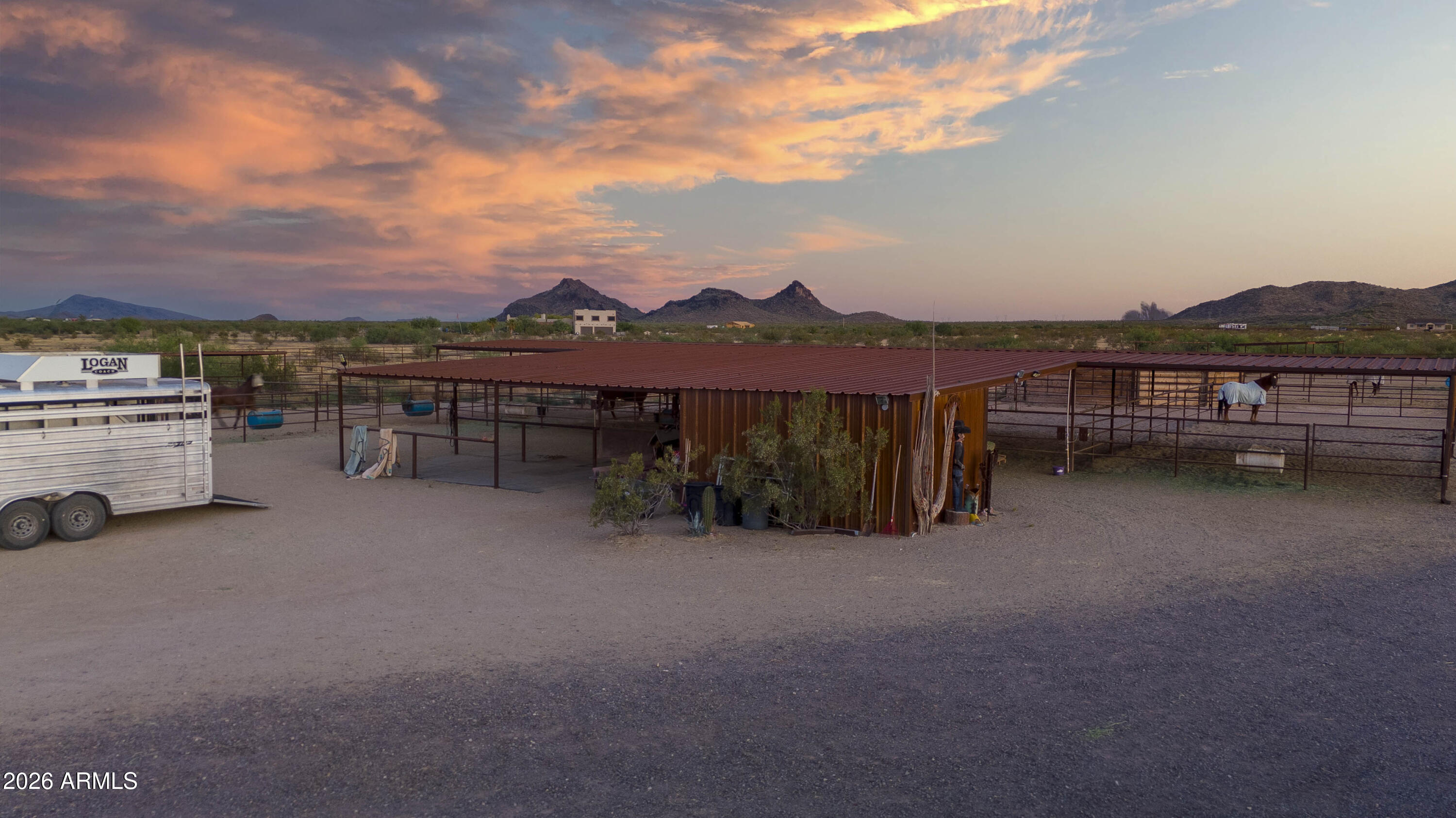 52510 Williams Road Aguila, AZ 85320 - Photo 45 of 62 a view of a terrace with a table and a chairs