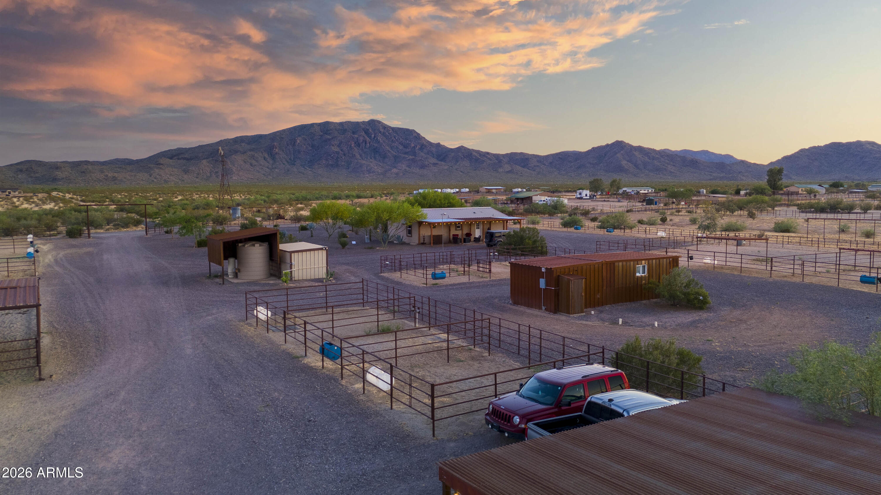 52510 Williams Road Aguila, AZ 85320 - Photo 5 of 62 a view of a terrace with furniture and a garden