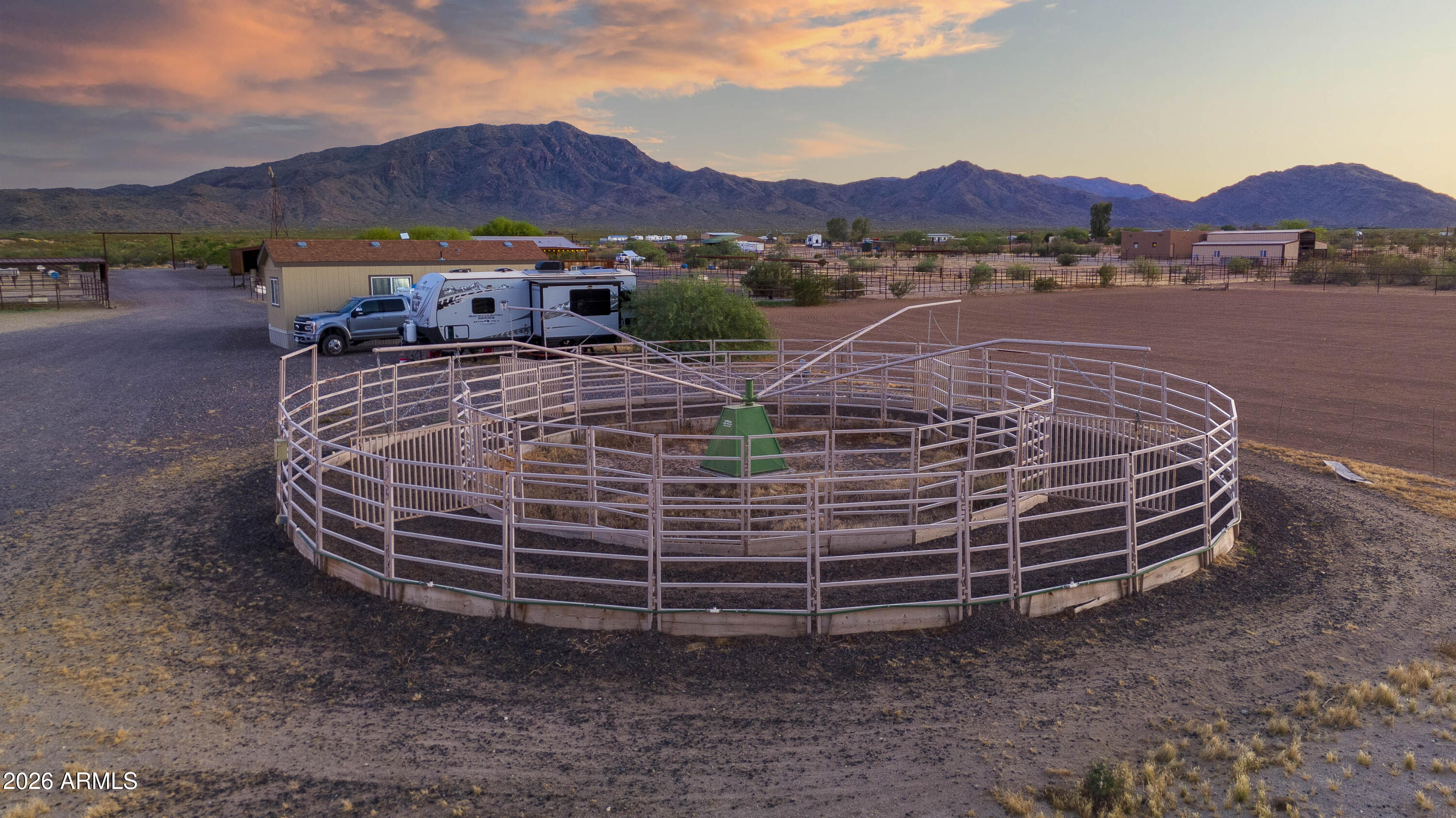 52510 Williams Road Aguila, AZ 85320 - Photo 52 of 62 a view of a house with a yard and a tub