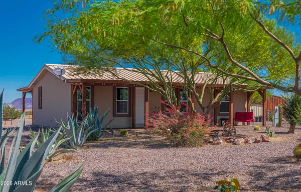 a house view with a outdoor space