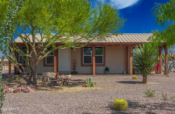a view of a backyard space with potted plants