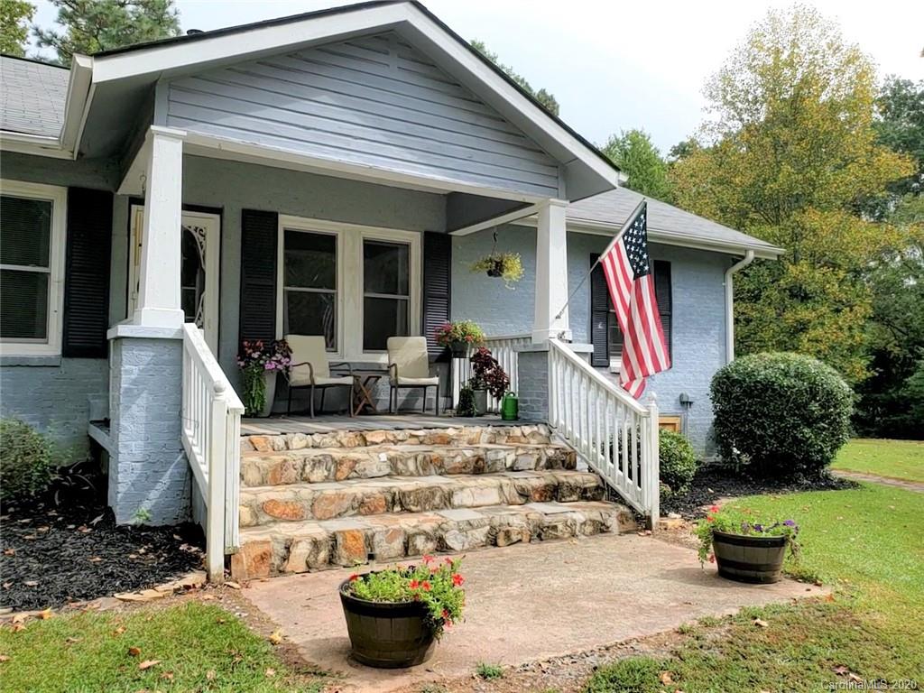 1602 Griffith Road Monroe, NC 28112 - Photo 2 of 45 a front view of house with yard and seating area