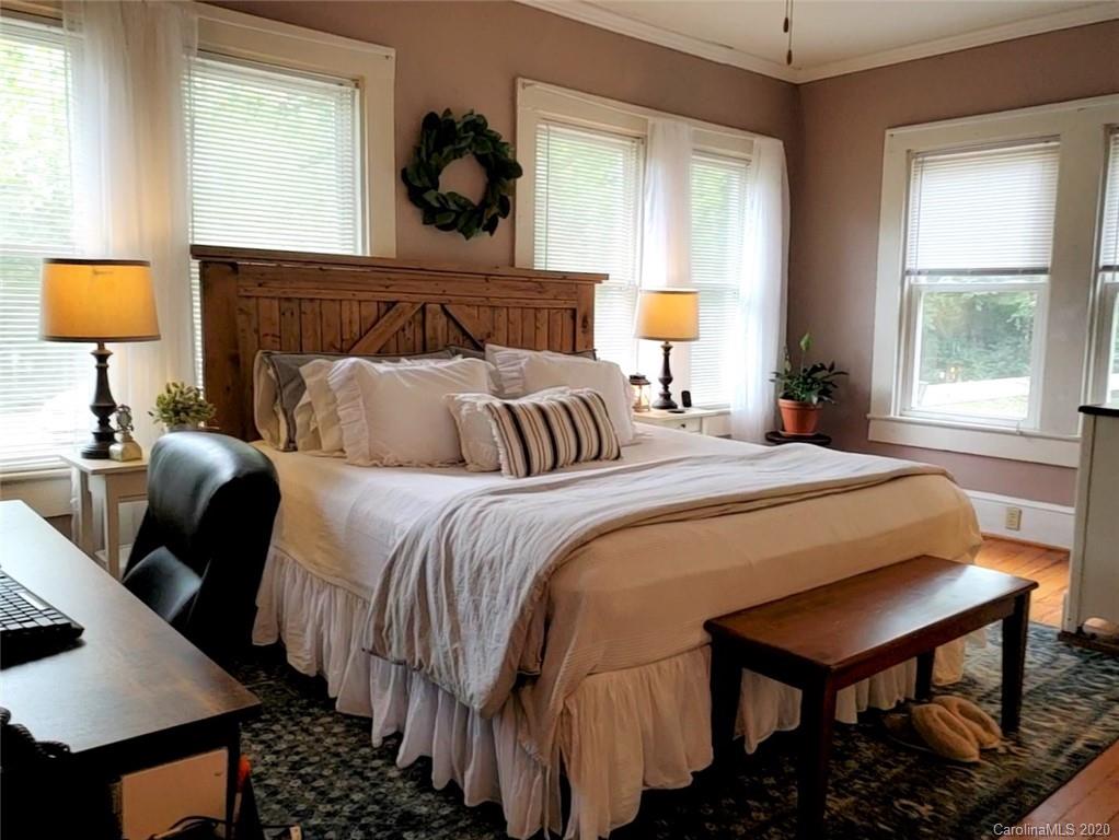 1602 Griffith Road Monroe, NC 28112 - Photo 21 of 45 a bedroom with a bed and window