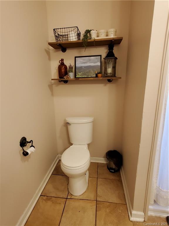 1602 Griffith Road Monroe, NC 28112 - Photo 23 of 45 a bathroom with a sink and a toilet