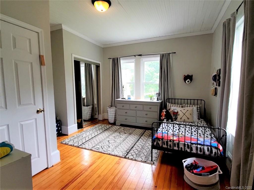 1602 Griffith Road Monroe, NC 28112 - Photo 30 of 45 a bedroom with a bed and a window