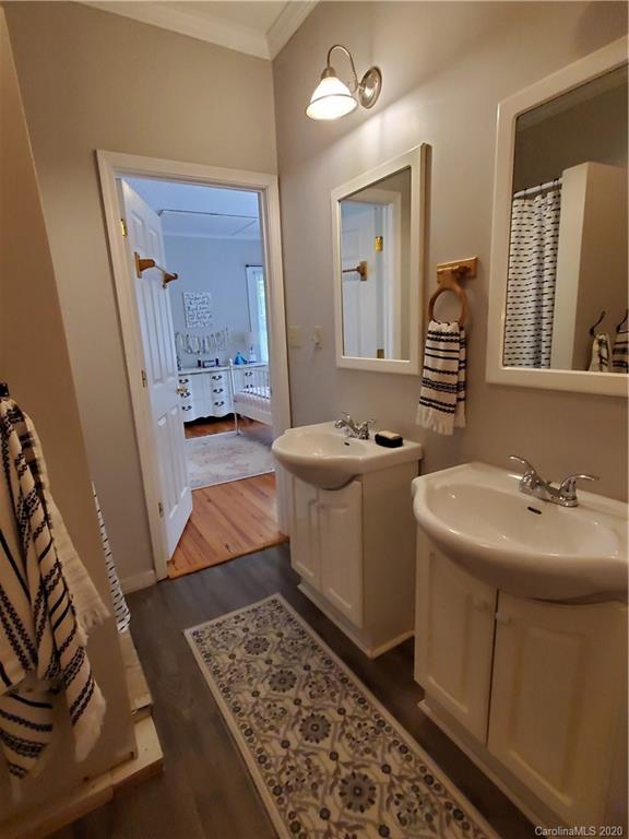1602 Griffith Road Monroe, NC 28112 - Photo 31 of 45 a bathroom with a sink and mirror with toilet