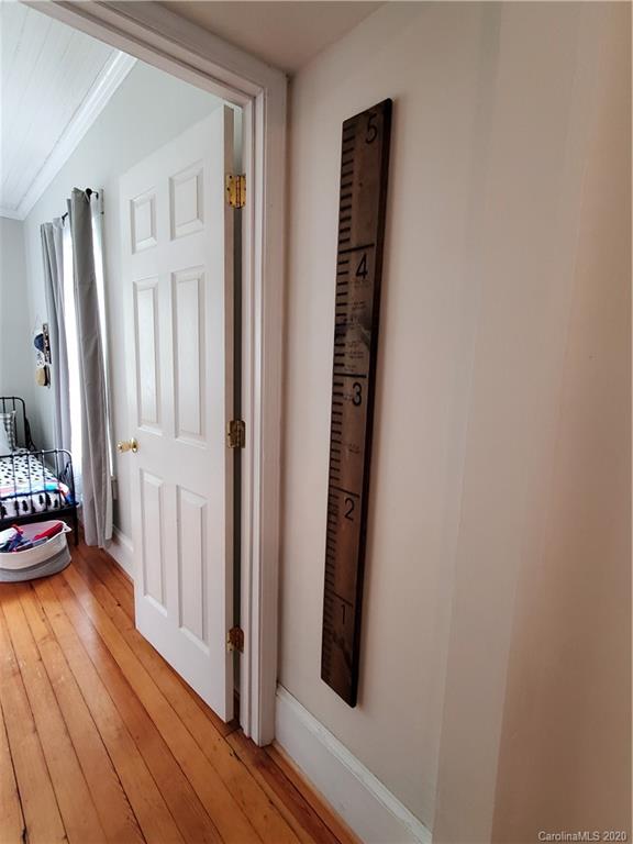 1602 Griffith Road Monroe, NC 28112 - Photo 35 of 45 a view of a hallway with wooden floor and closet