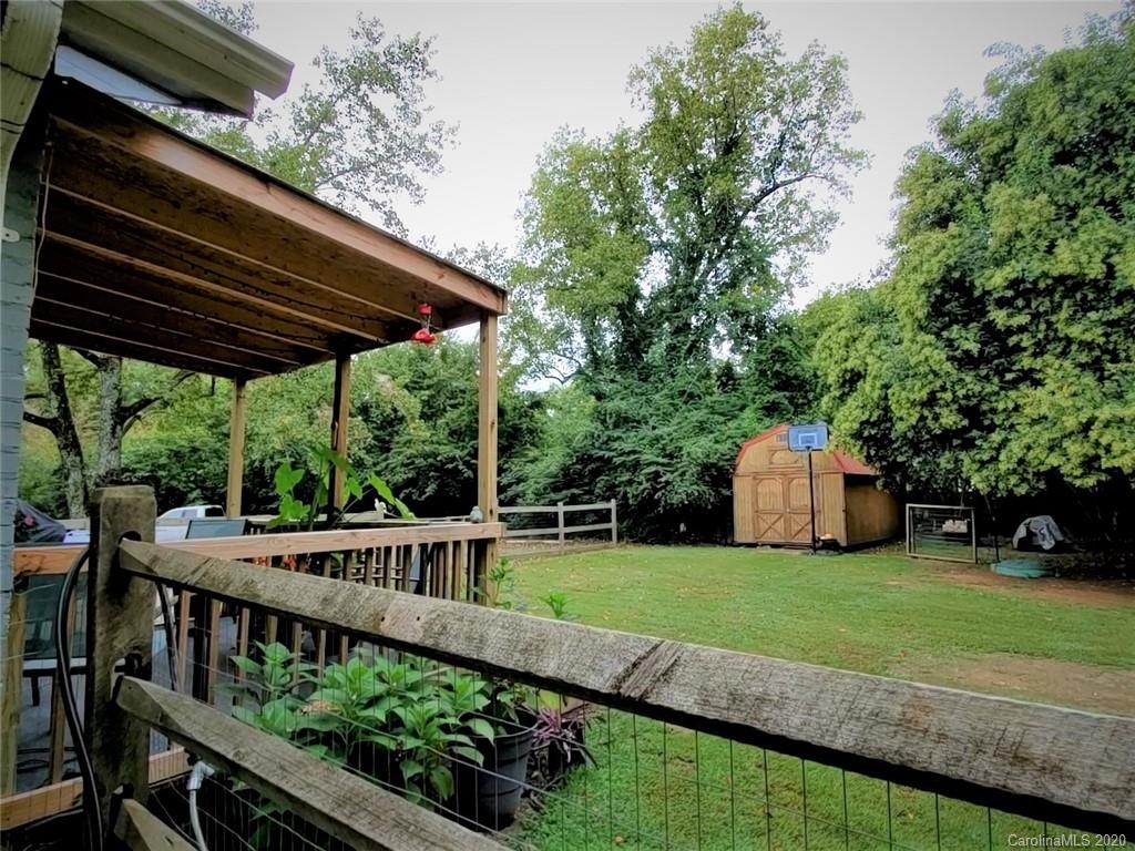 1602 Griffith Road Monroe, NC 28112 - Photo 38 of 45 a view of a house with backyard and sitting area