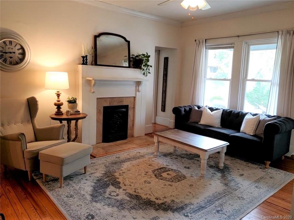 1602 Griffith Road Monroe, NC 28112 - Photo 5 of 45 a living room with furniture and a fireplace