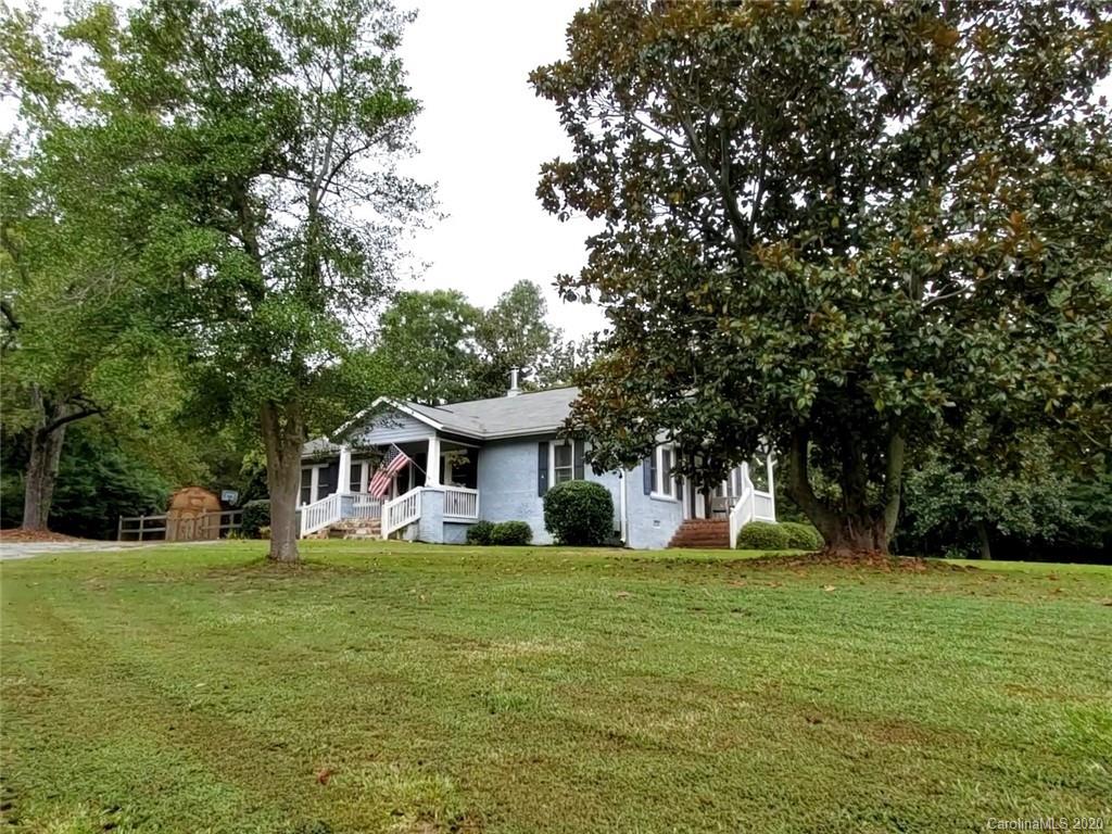1602 Griffith Road Monroe, NC 28112 - Photo 42 of 45 a front view of a house with garden