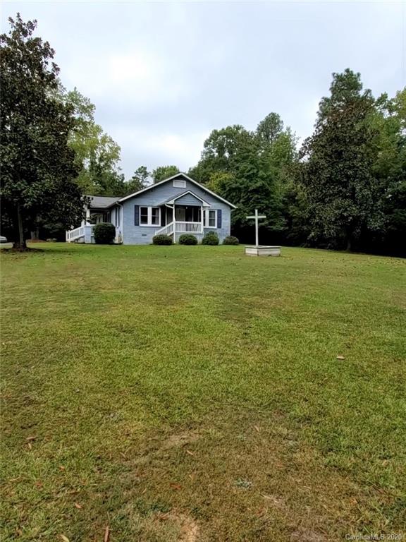 1602 Griffith Road Monroe, NC 28112 - Photo 43 of 45 a front view of a house with a garden