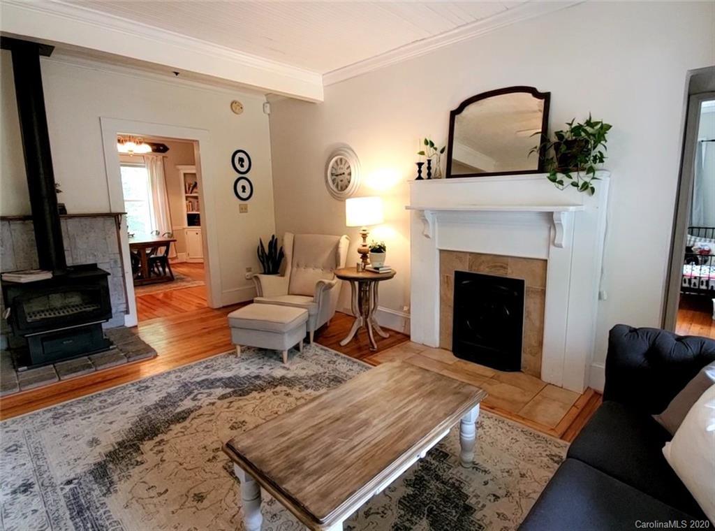1602 Griffith Road Monroe, NC 28112 - Photo 6 of 45 a living room with furniture and a fireplace