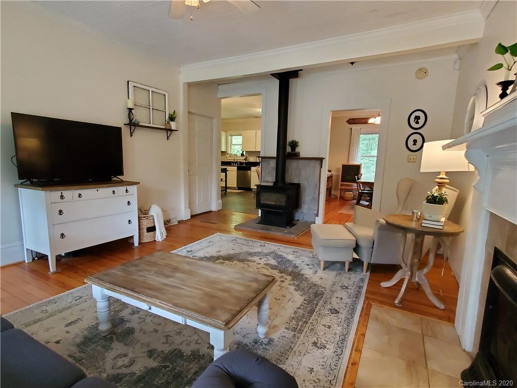 1602 Griffith Road Monroe, NC 28112 - Photo 9 of 45 a living room with furniture and a flat screen tv