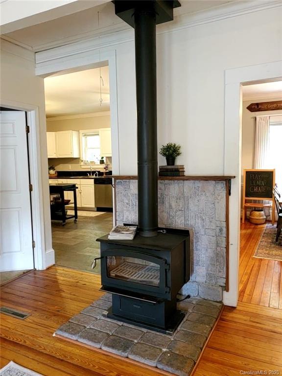 1602 Griffith Road Monroe, NC 28112 - Photo 10 of 45 a living room with furniture and a fireplace