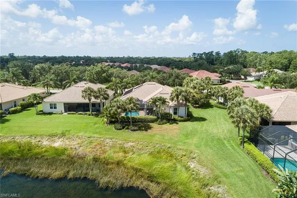 a view of a house with a big yard