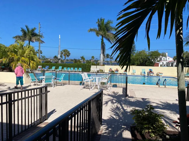 a view of street from balcony
