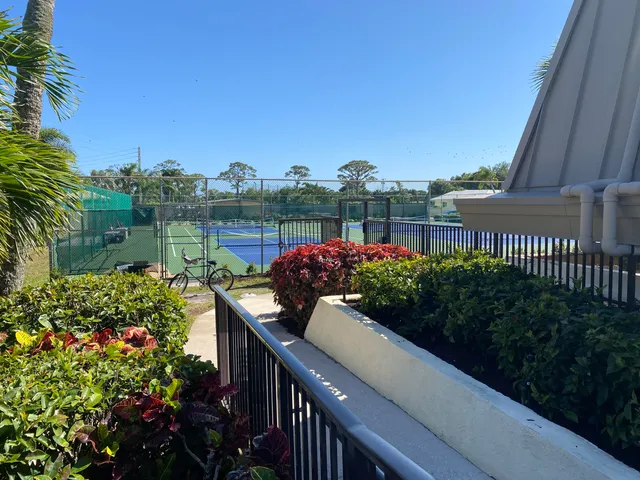 a view of a lake from a balcony