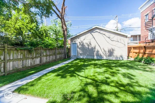 a view of backyard with green space