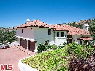15 Stallion Road Bell Canyon, CA 91307 - Photo 1 of 1 a front view of a house with a garden
