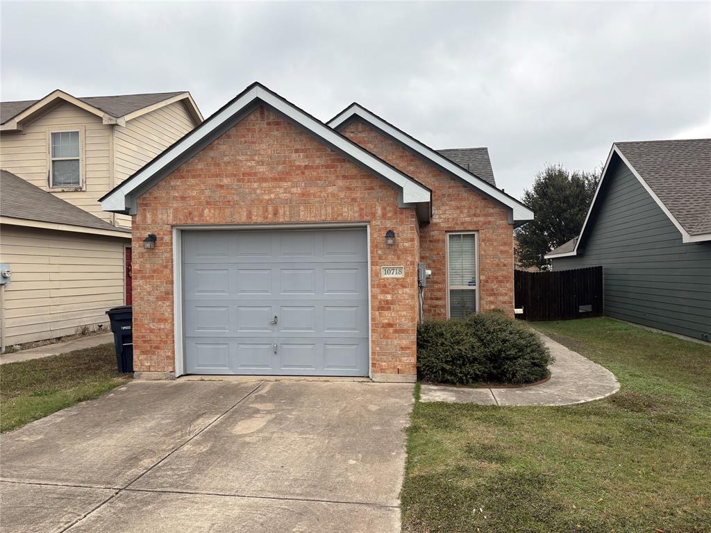 10718 Edgewest Terrace Fort Worth, TX 76108 - Photo 1 of 15 a view of garage and yard
