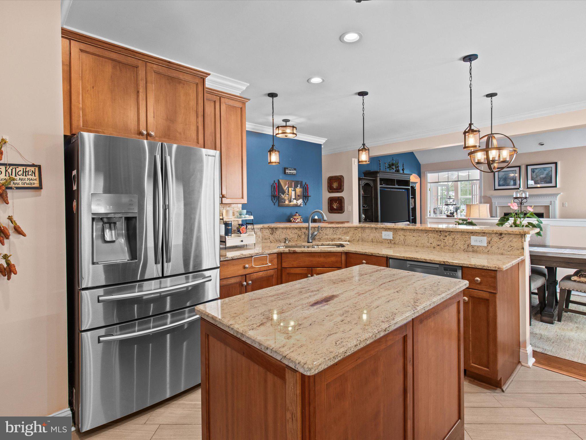 6 Marbella Court Hamilton, NJ 08691 - Photo 15 of 46 a kitchen with stainless steel appliances granite countertop a kitchen island a stove a refrigerator a oven and a center island