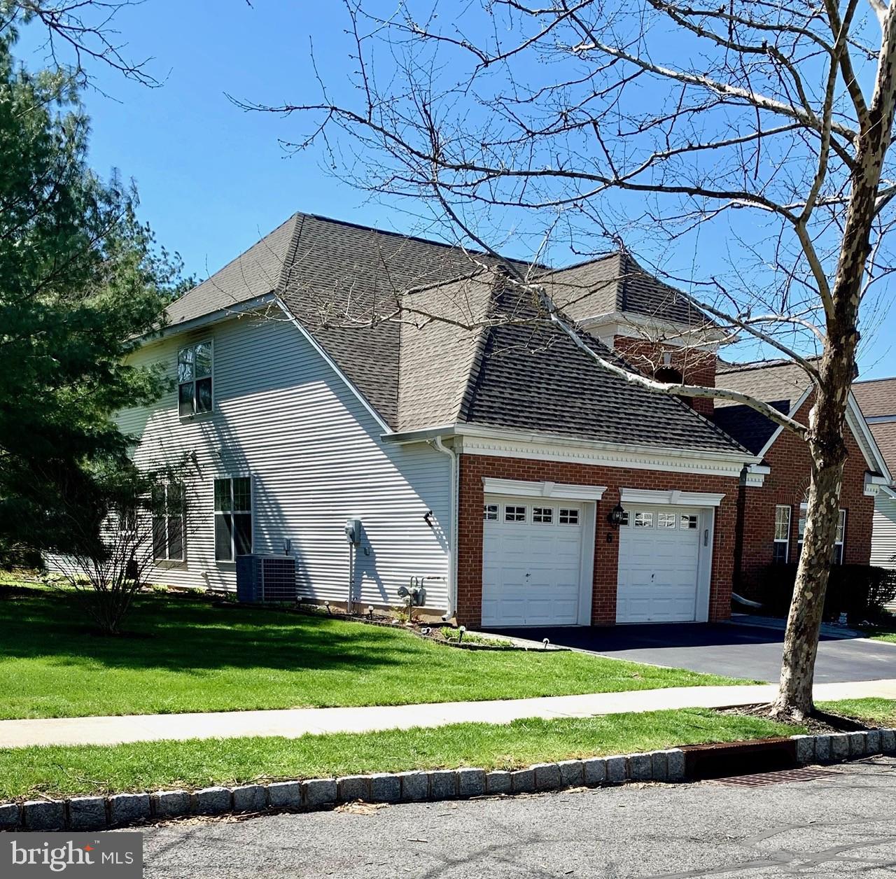 6 Marbella Court Hamilton, NJ 08691 - Photo 2 of 46 a view of a house with a yard