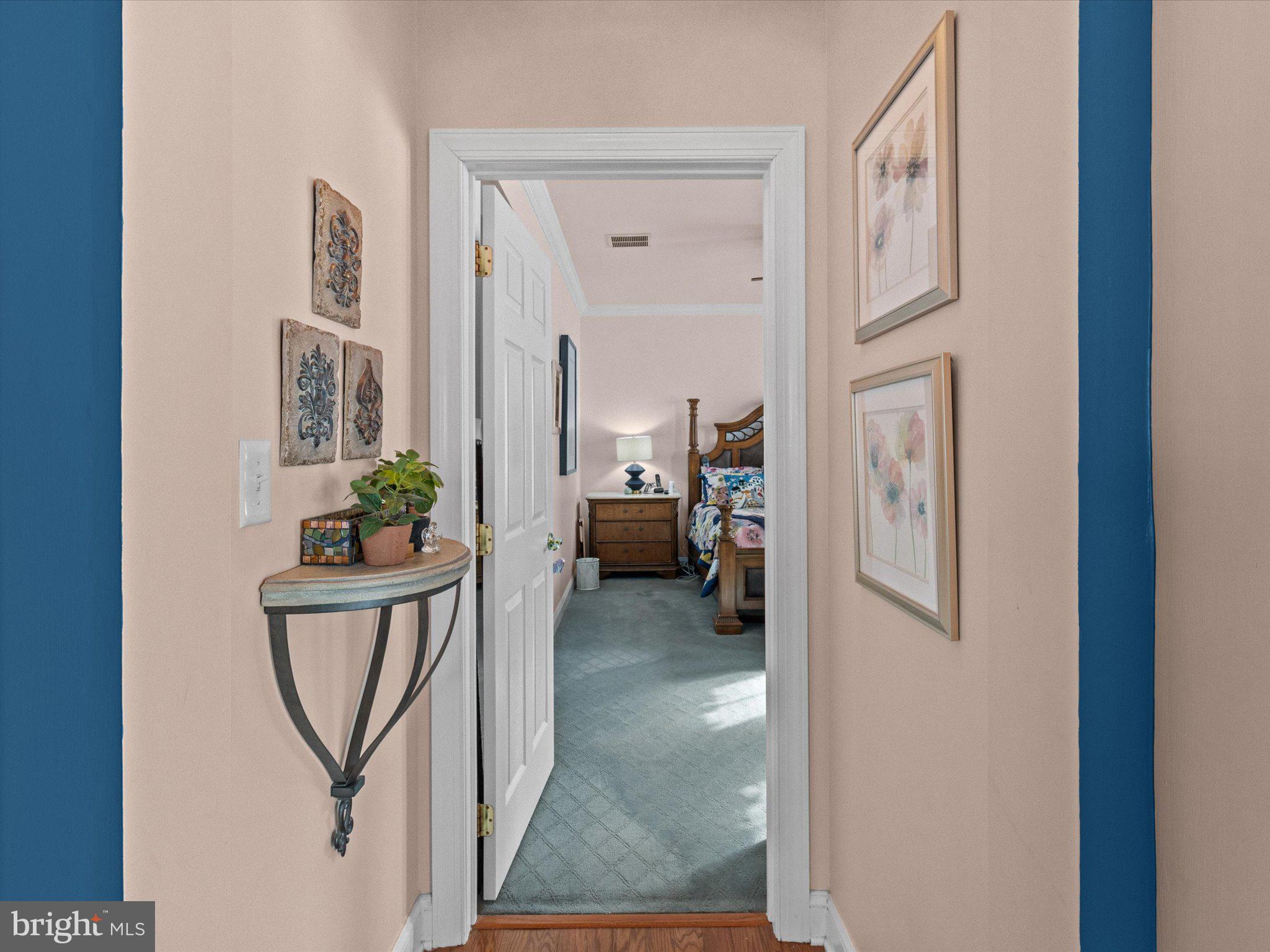 6 Marbella Court Hamilton, NJ 08691 - Photo 22 of 46 a view of a hallway with workspace and a livingroom