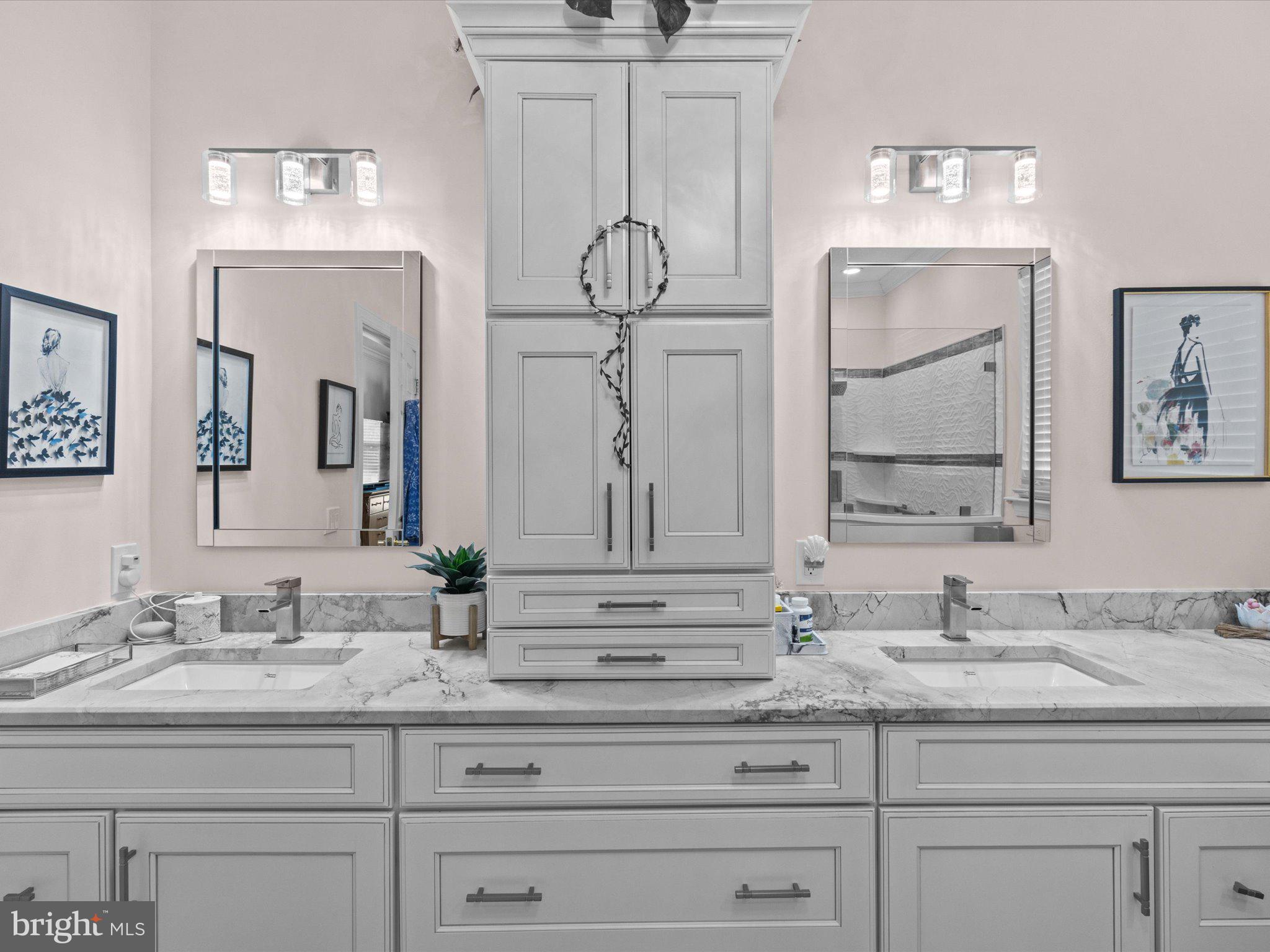 6 Marbella Court Hamilton, NJ 08691 - Photo 25 of 46 a bathroom with double vanity sinks and a mirror