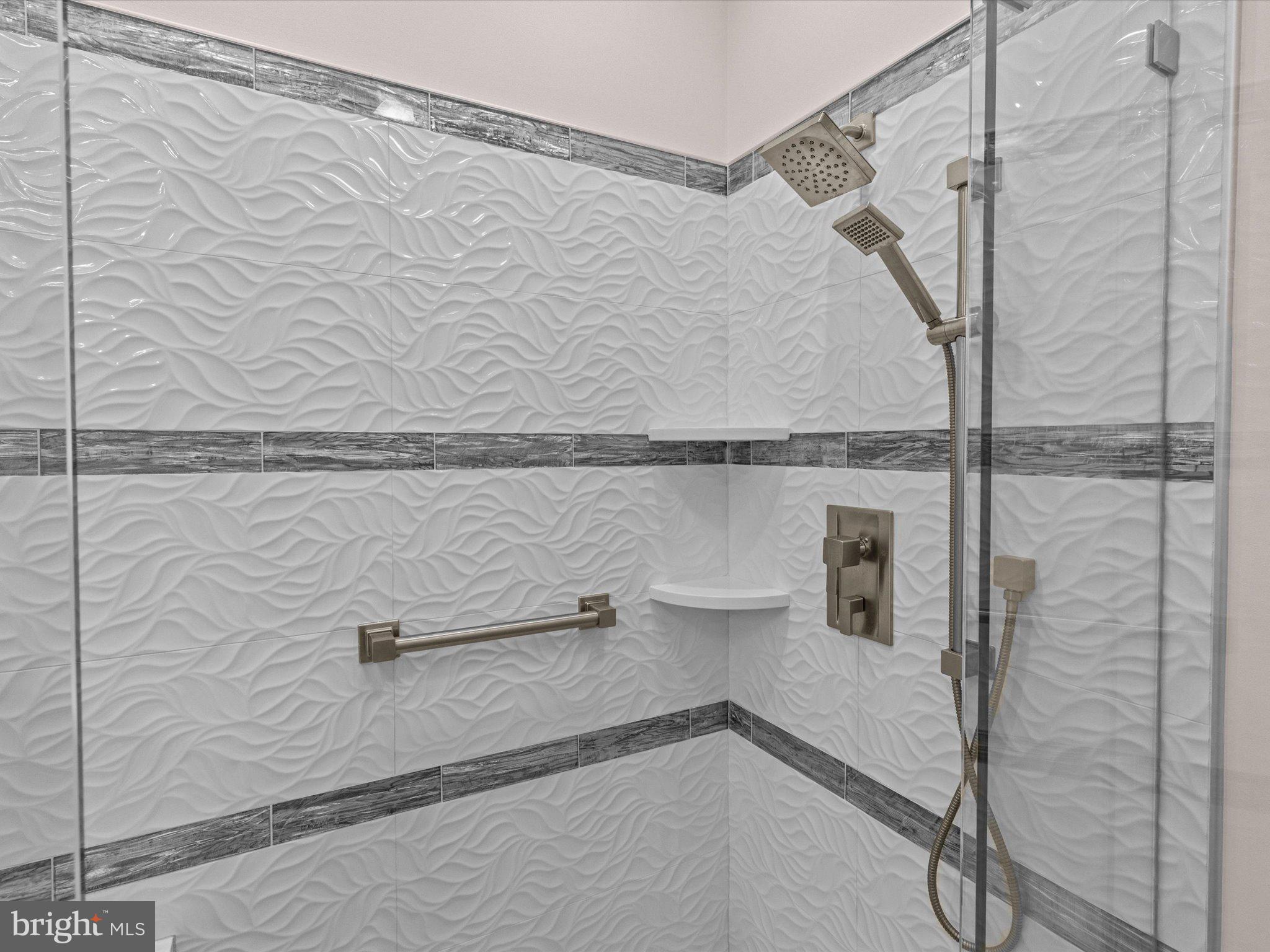 6 Marbella Court Hamilton, NJ 08691 - Photo 28 of 46 a bathroom with a shower