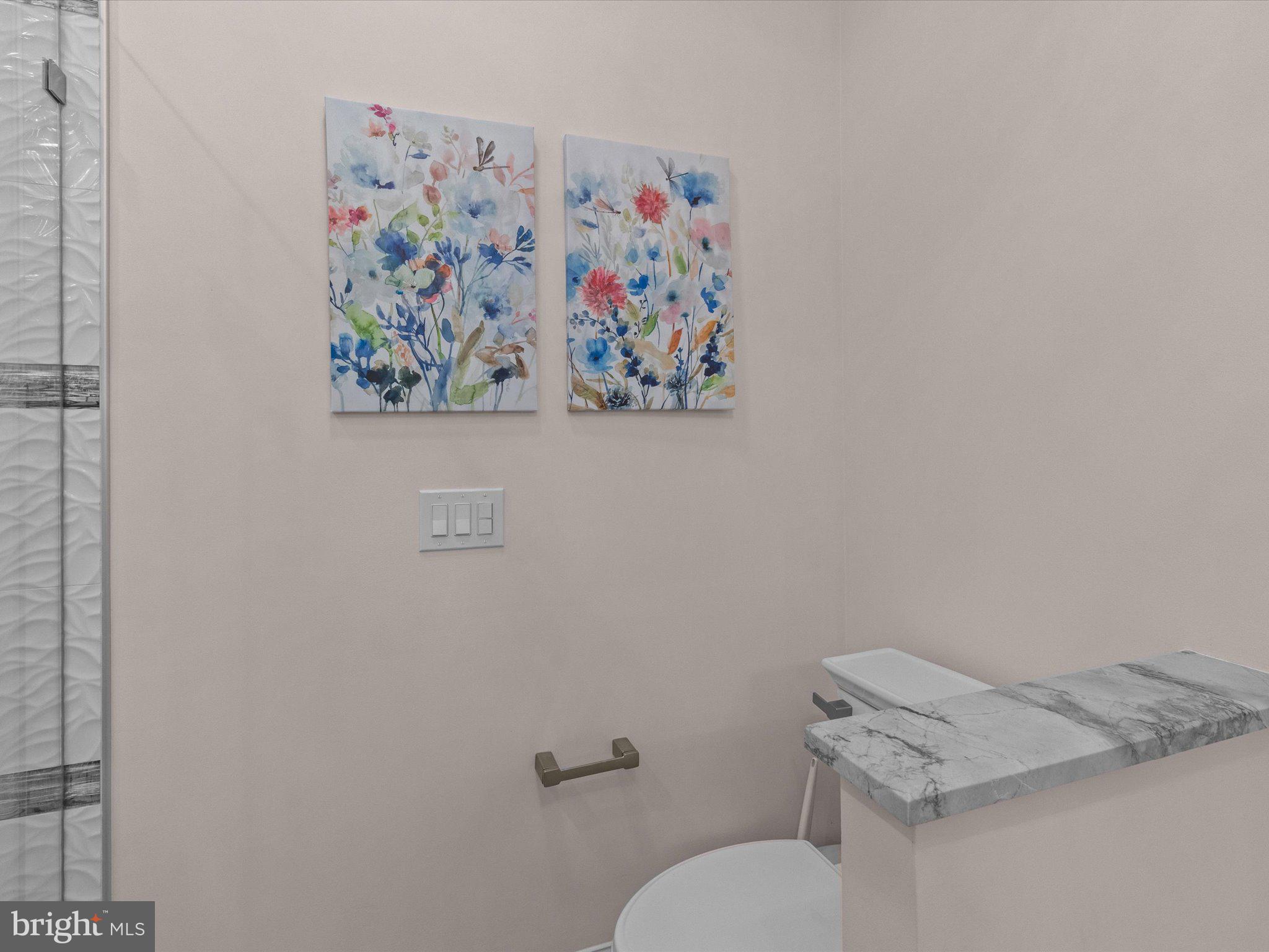 6 Marbella Court Hamilton, NJ 08691 - Photo 29 of 46 a white toilet sitting next to a white wall