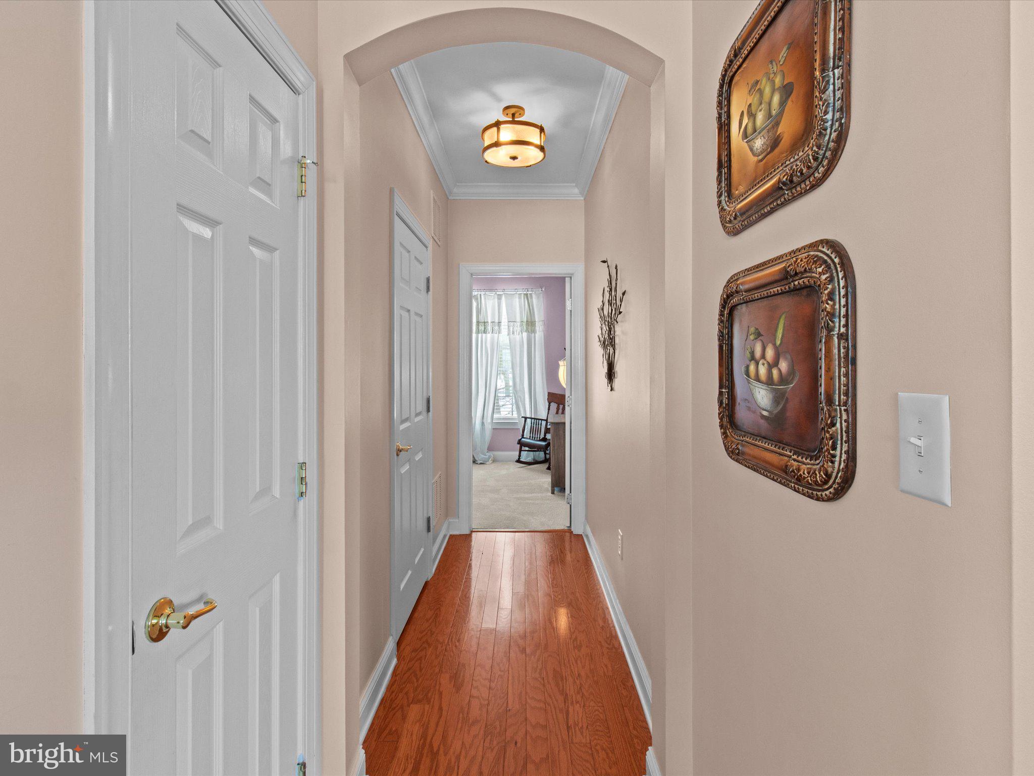 6 Marbella Court Hamilton, NJ 08691 - Photo 34 of 46 a view of a hallway to a house with entrance and stairs
