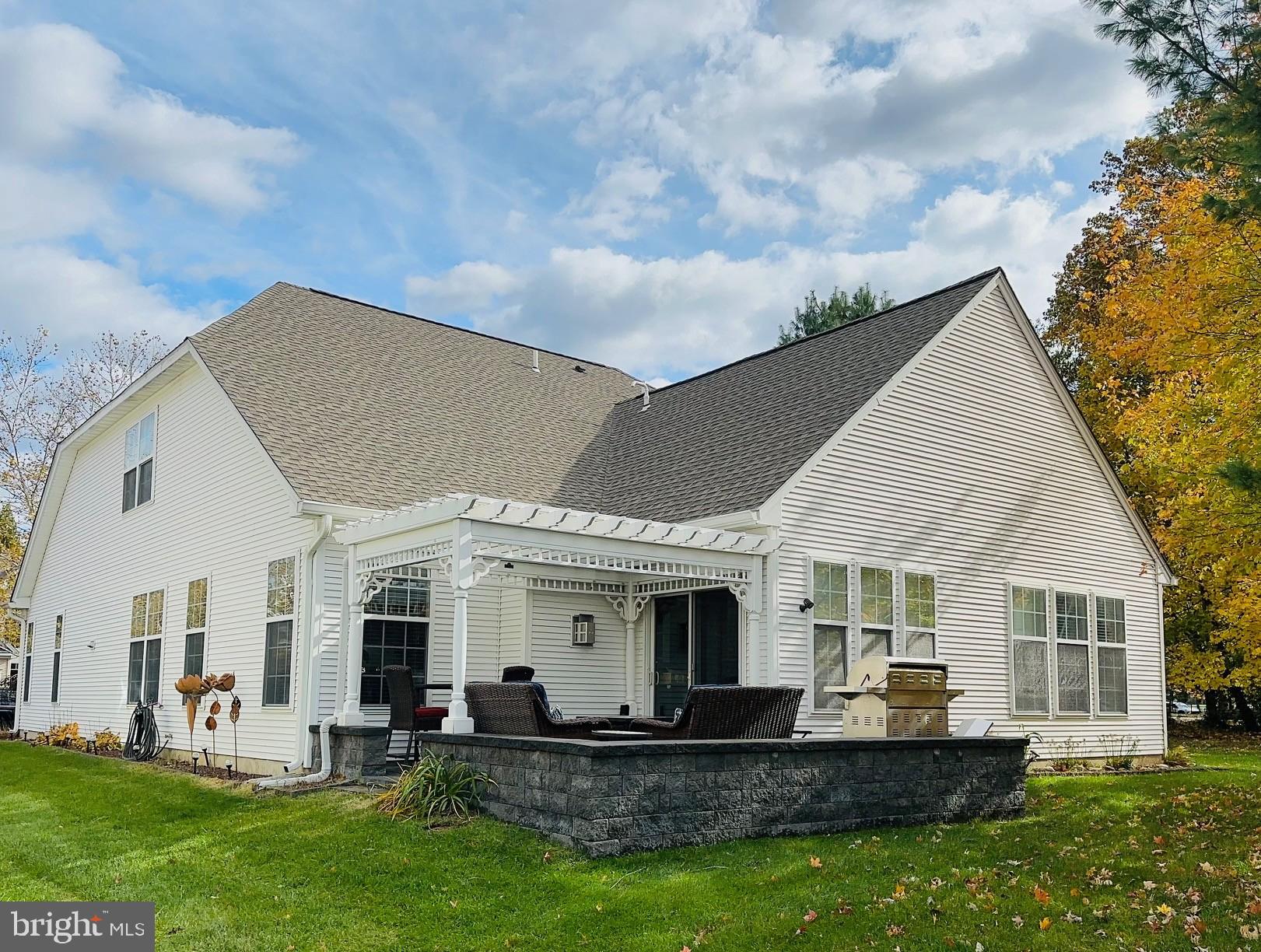 6 Marbella Court Hamilton, NJ 08691 - Photo 43 of 46 a front view of house with yard outdoor seating and barbeque oven