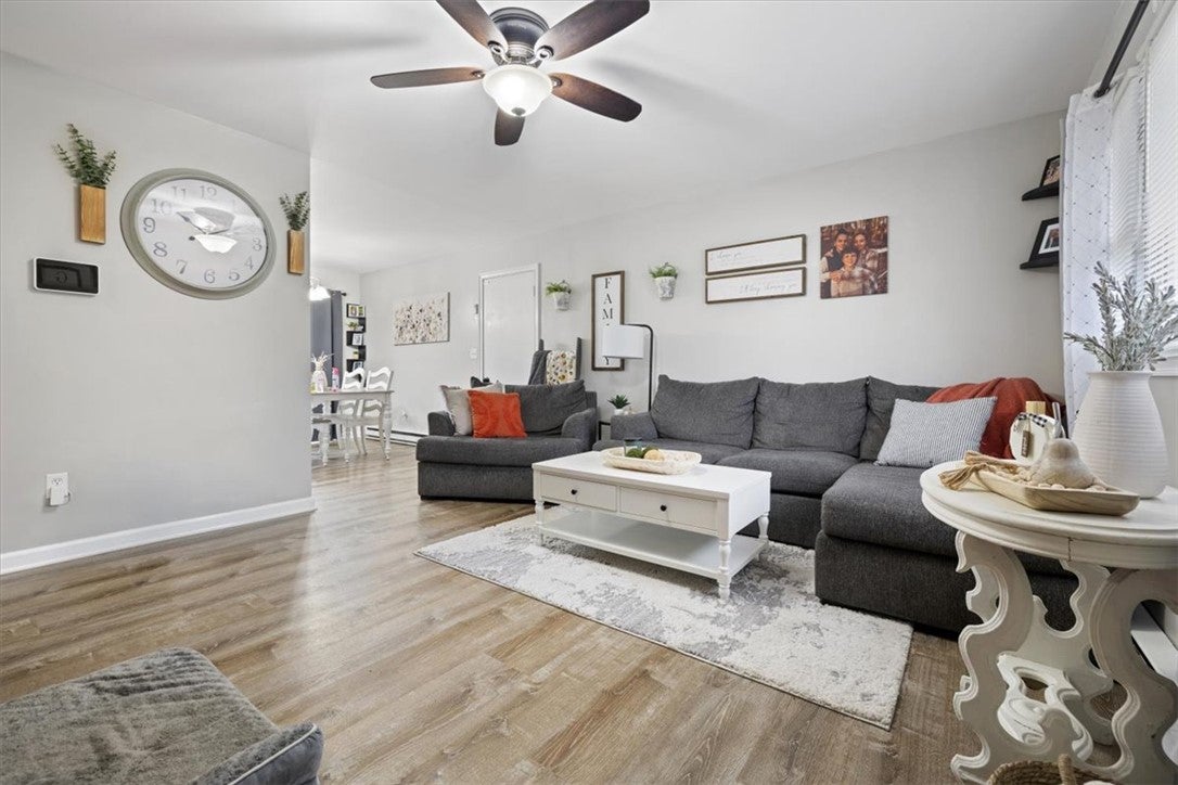1482 Lee Road Troy, OH 45373 - Photo 5 of 30 This inviting space features durable flooring and a refreshing ceiling fan, ideal for everyday living.