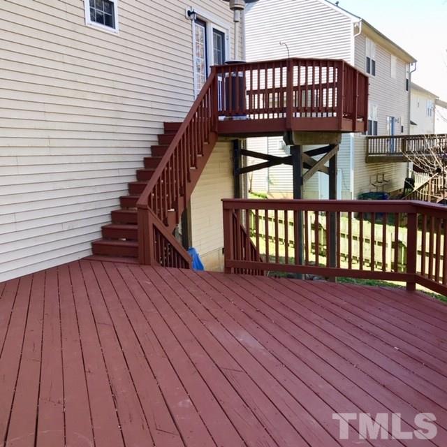 2421 Springfield Park Drive Raleigh, NC 27614 - Photo 21 of 30 There are 2 huge decks for entertaining. You may consider screening one in for added uses.