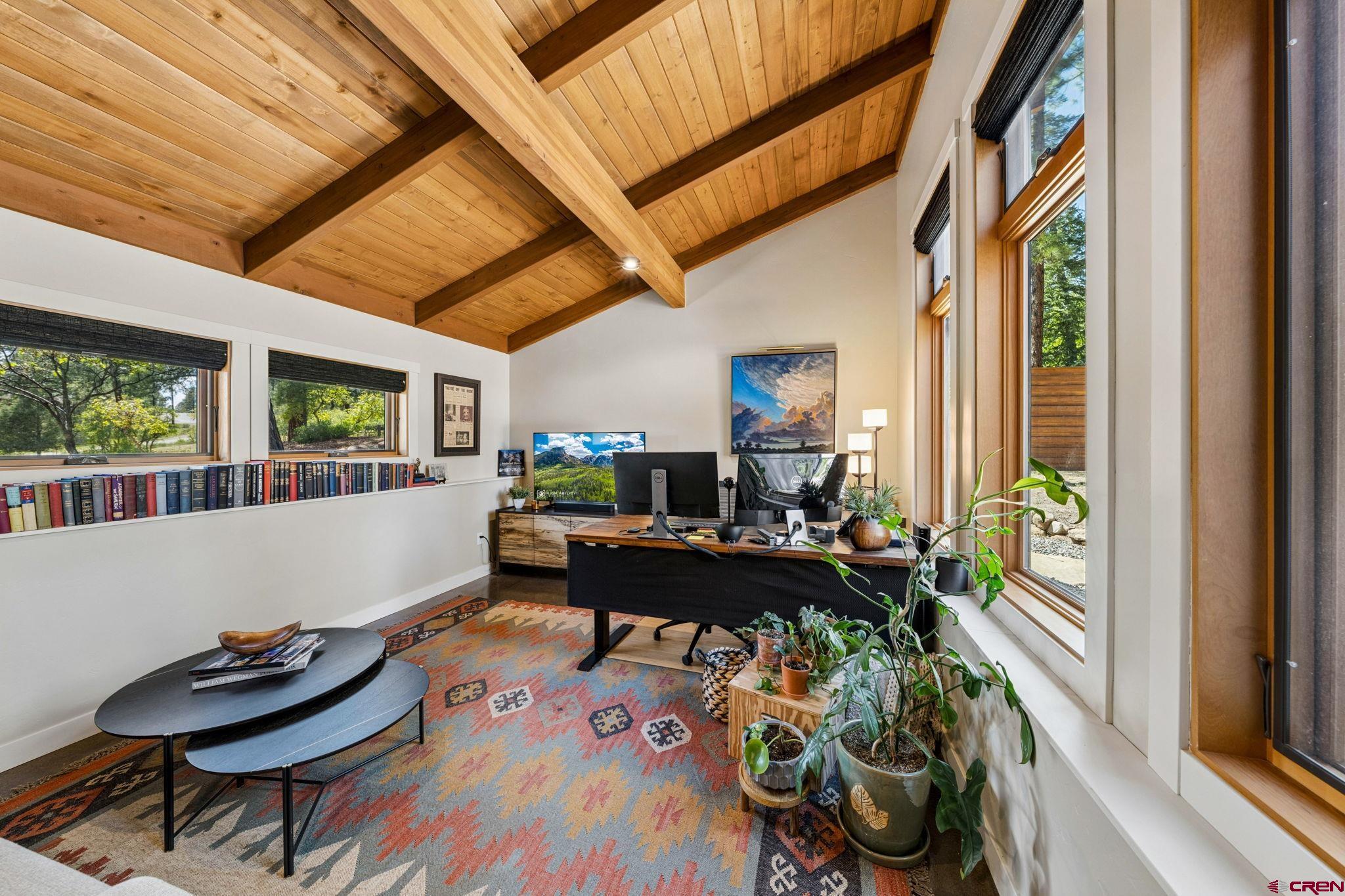 24 Monarch Crest Trail Durango, CO 81301 - Photo 24 of 45 a living room with furniture and a potted plant