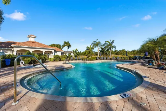 a view of a swimming pool and outdoor space