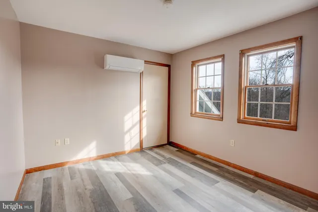 a view of a balcony with wooden fence
