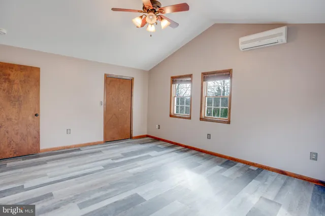 a view of a backyard of the house