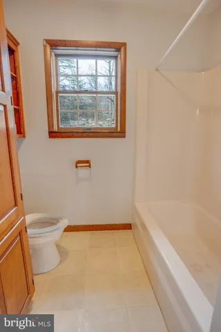 a view of a street with some trees