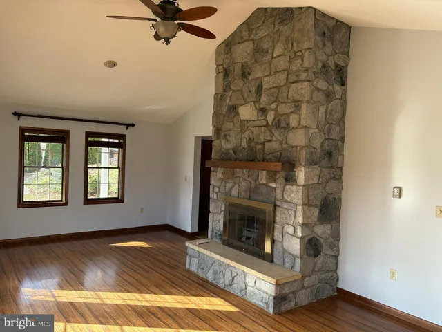 a living room with a fireplace